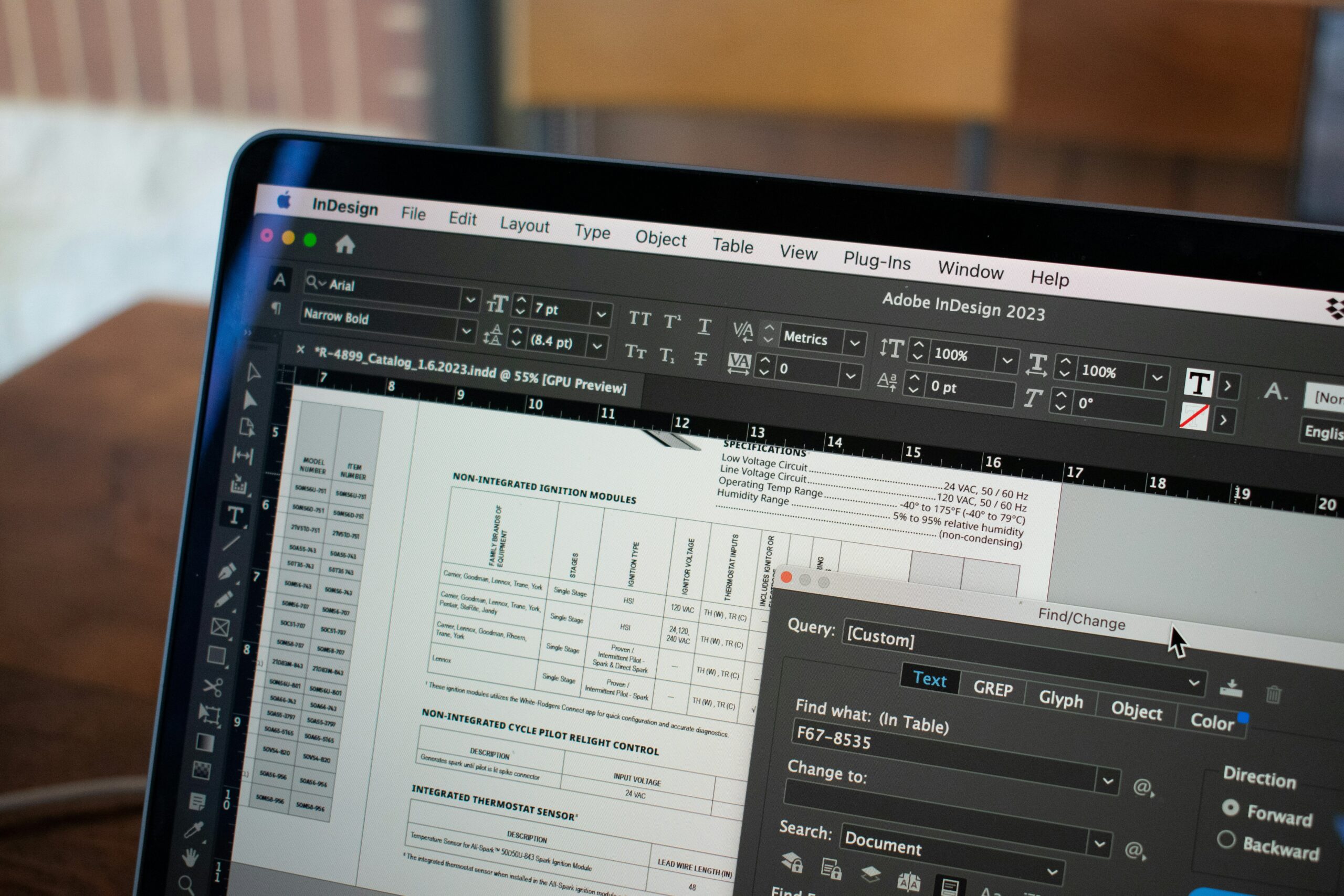 A computer screen showing someone working on an InDesign file.