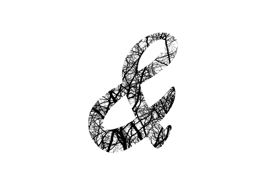 An ampersand (&) symbol created in Photoshop, filled with a photo of branches. The symbol is on a white background.